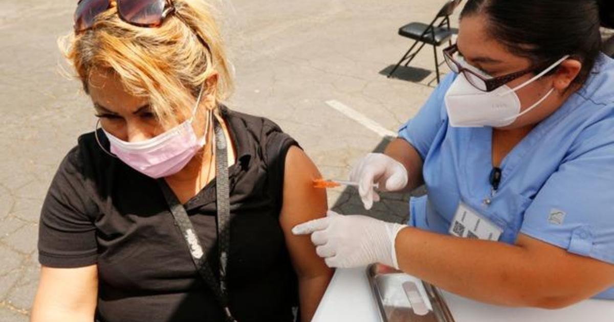 Officials push COVID vaccinations as CDC predicts a rise in cases and hospitalizations